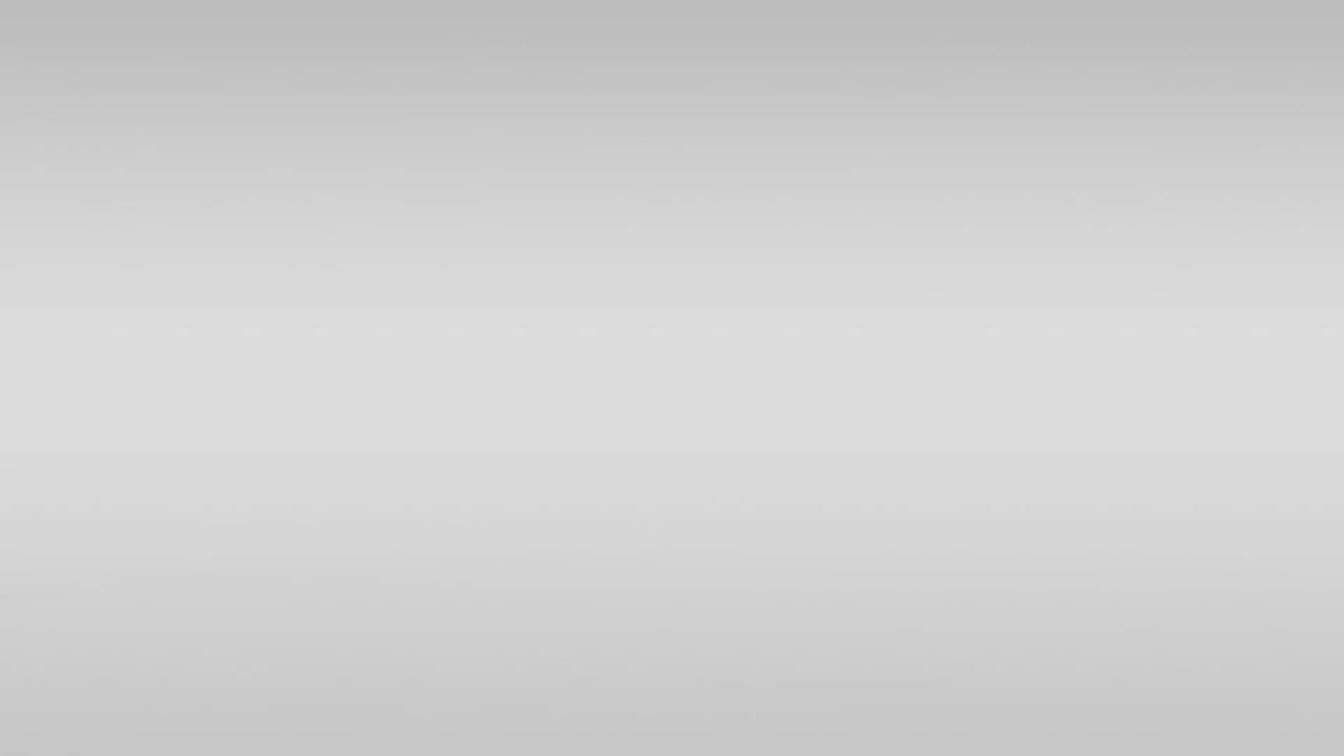 Product showcase of the Ergohuman Elite Gen-2 ergonomic chair, displaying its sleek mesh design and various available colours including blue, pink, and green